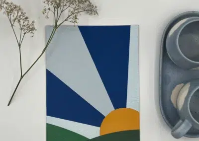 Carte colorée avec lever de soleil
